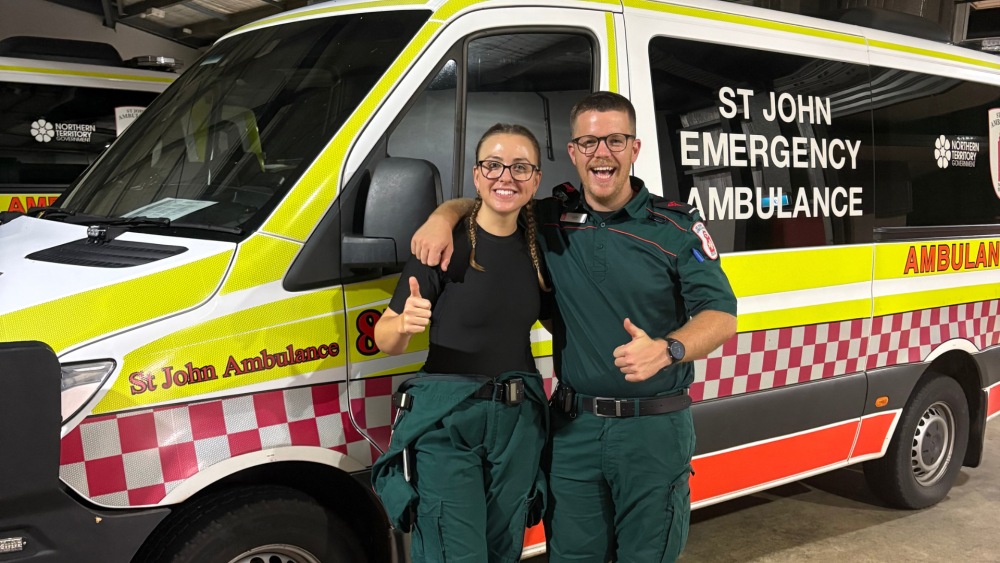 St John paramedics Emily Griffiths and Lachlan Mikic smiling in celebration of Venice’s safe arrival.