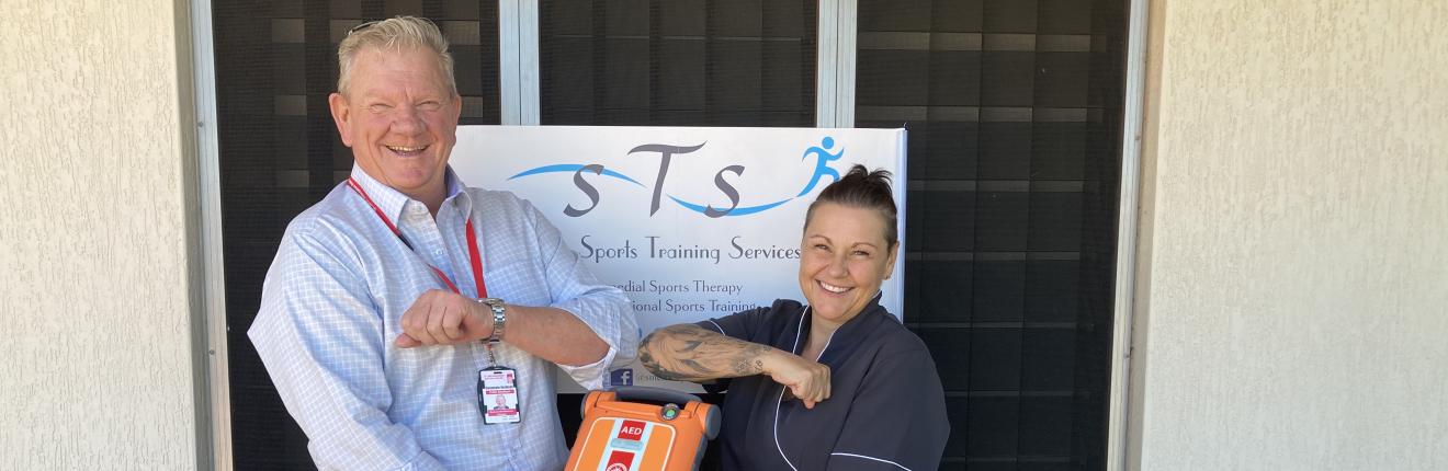 Giving Katherine business an AED.