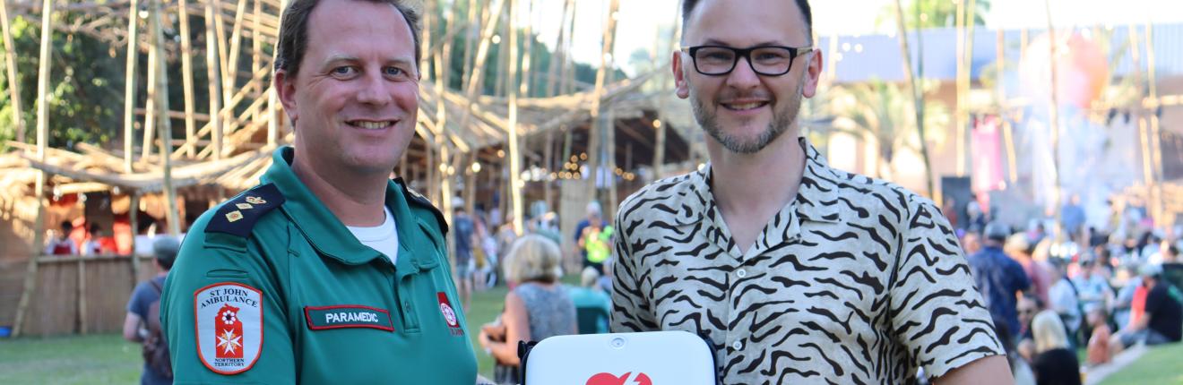 Darwin Festival receiving St John donation.