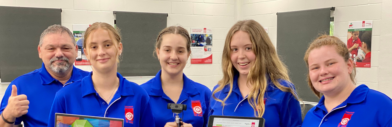 Darwin Youth Members holding new equipment.