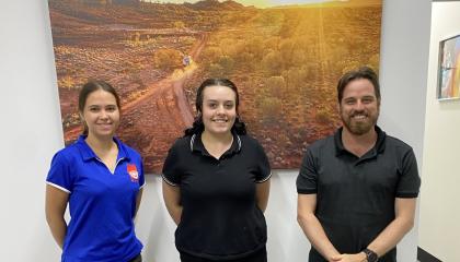 Three new St John NT recruits standing.