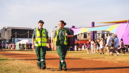 Volunteers Makaylia and Taya Mai at BASSINTHEGRASS