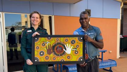Abbey Studley and Curtis Haines pictured with new Saving Lives artwork